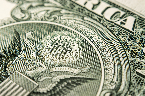 Decorative picture featuring a detail of the US one dollar bill.