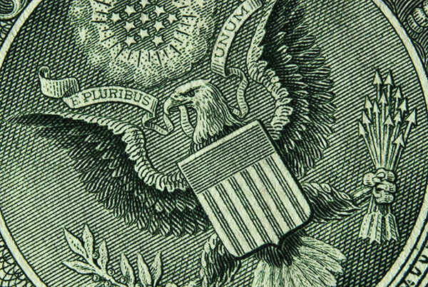 Kuvituskuva, jossa näkyy yksityiskohta Yhdysvaltain dollarin setelistä.